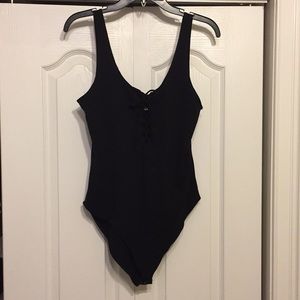 Pink Victoria’s Secret body suit